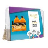 Подаръчен комплект Nature Box със студено пресовано арганово масло: шампоан 385 мл + душ гел 385 мл + масло за лечение на коса 70 мл